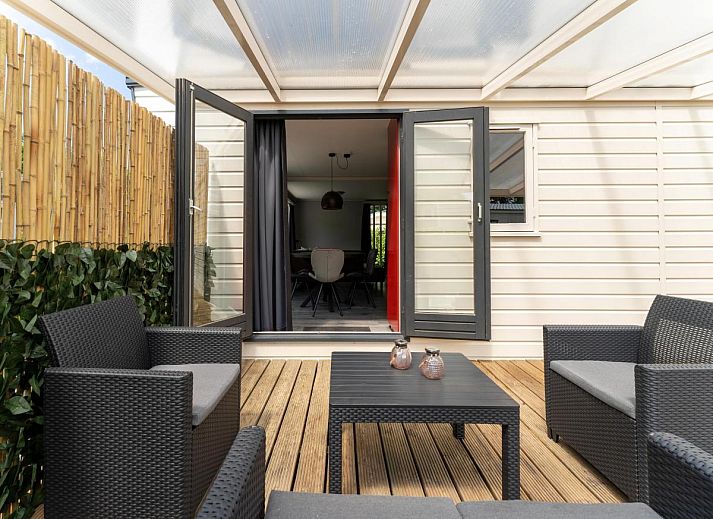 Stijlvolle woonkamer van 't Kaatsheuveltje 7, vakantiehuis in Kaatsheuvel, Noord Brabant, met moderne inrichting.