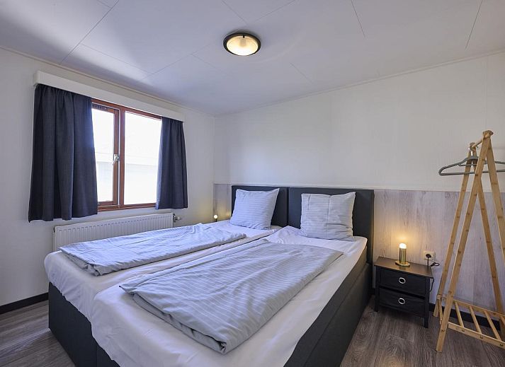 Stijlvolle woonkamer van 't Kaatsheuveltje 7, vakantiehuis in Kaatsheuvel, Noord Brabant, met moderne inrichting.