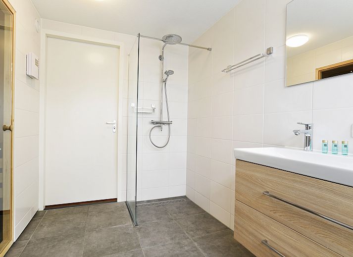 Spacious living room of the vacation home Kaatsheuvel, perfect for 12 people, in North Brabant.