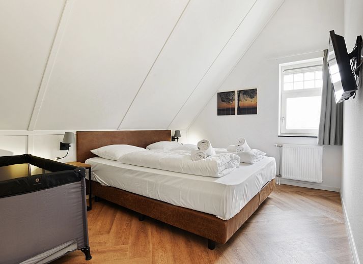 Spacious living room of the vacation home Kaatsheuvel, perfect for 12 people, in North Brabant.