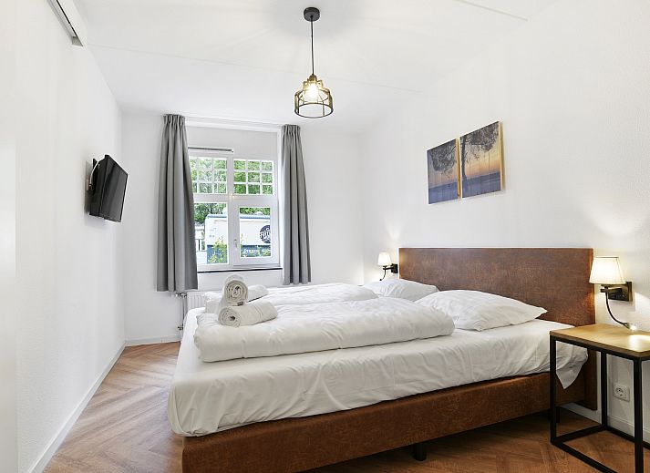 Spacious living room of the vacation home Kaatsheuvel, perfect for 12 people, in North Brabant.