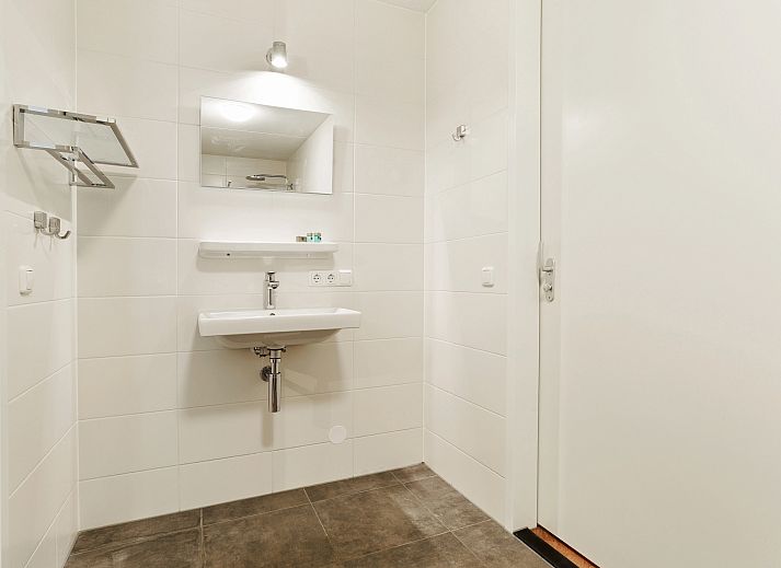 Comfortable sitting area in the 12-person vacation home Kaatsheuvel, Hart van Brabant.