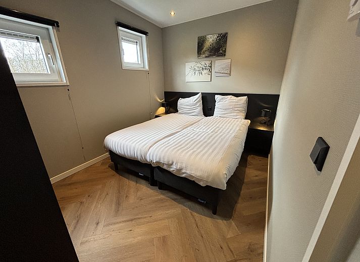 Offene Kche und Essbereich im Chalet in Kaatsheuvel, perfekt fr einen entspannten Urlaub in Hart van Brabant.