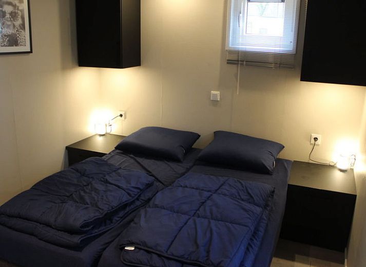 Buitenkant van Vakantiehuis Just Nature 4, vakantiehuis in Kaatsheuvel, Hart van Brabant, omgeven door groene natuur.