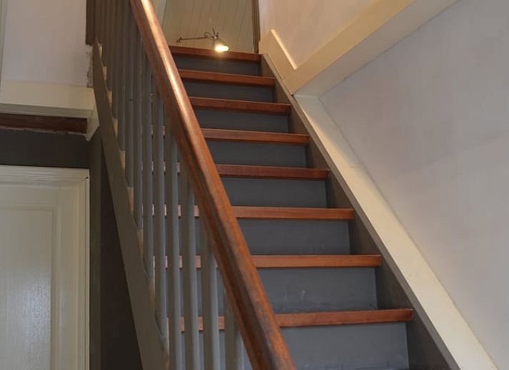 Geniet van een sfeervol terras bij Vakantiehuisje in Sleeuwijk, Hart van Brabant, Noord Brabant, omringd door groene natuur.