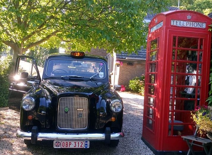 Cozy living room in Cottage in Hank, vacation home in Heart of Brabant, North Brabant, overlooking the garden.