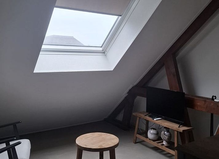 Karakteristieke groene luiken van Vakantiehuisje in Hank, Noord Brabant, benadrukken de authentieke charme van dit vakantiehuis in Hart van Brabant.