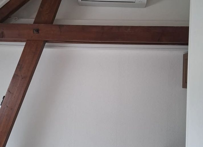 Karakteristieke groene luiken van Vakantiehuisje in Hank, Noord Brabant, benadrukken de authentieke charme van dit vakantiehuis in Hart van Brabant.