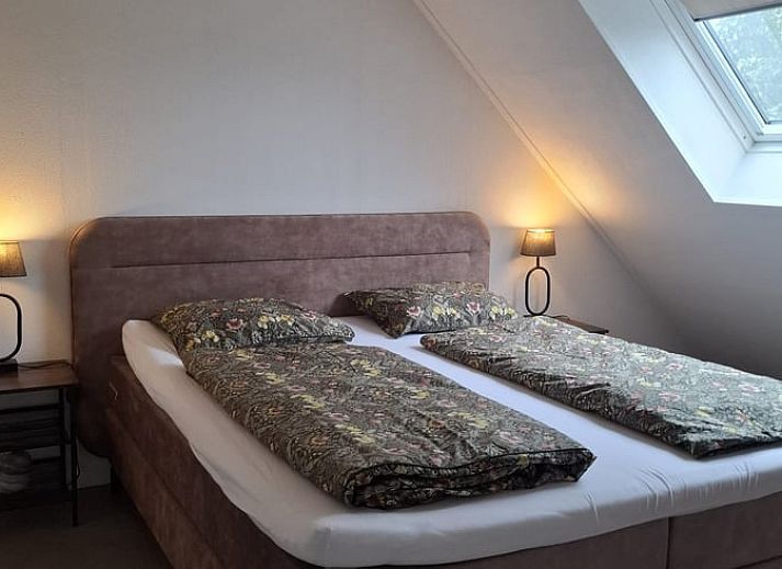 Slaapkamer in Vakantiehuisje in Hank, Noord Brabant, biedt een comfortabele en rustige ruimte voor een ontspannen verblijf in Hart van Brabant.