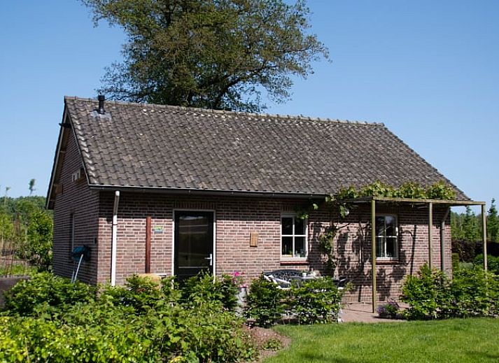 Stylish dining room with art on the wall in Holiday home in Boxtel, Heart of Brabant, North Brabant.