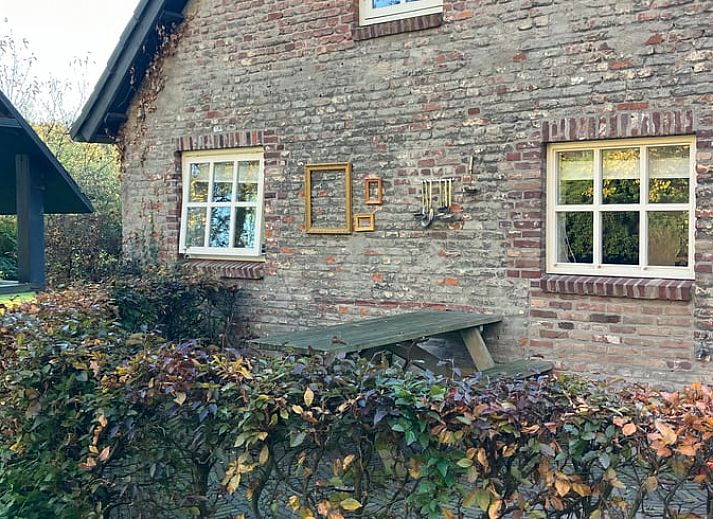 Charmantes Ferienhaus in Boxtel, im Herzen von Brabant, mit einer rustikalen Backsteinfassade und einer einladenden Terrasse fuer einen entspannten Aufenthalt.