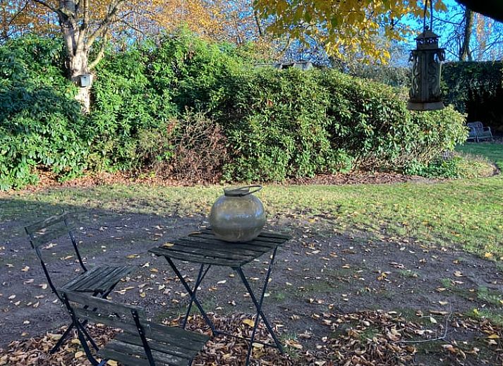 Charmantes Ferienhaus in Boxtel, im Herzen von Brabant, mit einer rustikalen Backsteinfassade und einer einladenden Terrasse fuer einen entspannten Aufenthalt.