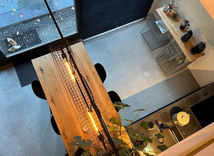 Geniet van de moderne buitenkeuken bij Huisje in Boxtel, een vakantiehuis in het hart van Brabant, Noord Brabant.