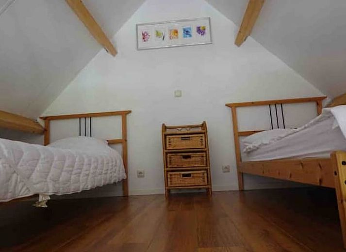 Ferienhaus in Loon op Zand mit Holzbruecke und gruenem Garten in Hart van Brabant, Nordbrabant.