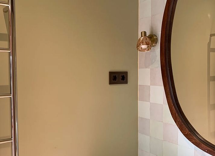 Cozy sitting area in cottage in Boxtel, Lennisheuvel, Heart of Brabant, North Brabant, overlooking the garden.