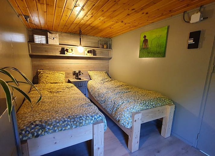 Ontspan op het terras van Vakantiehuisje in Tilburg, Noord Brabant.