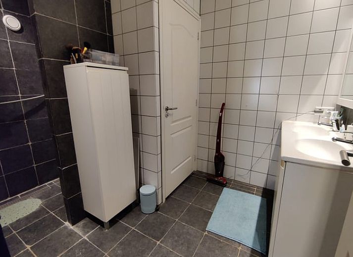 Cozy living room in Holiday home in Best, Heart of Brabant, with rustic decor and plenty of natural light in North Brabant.