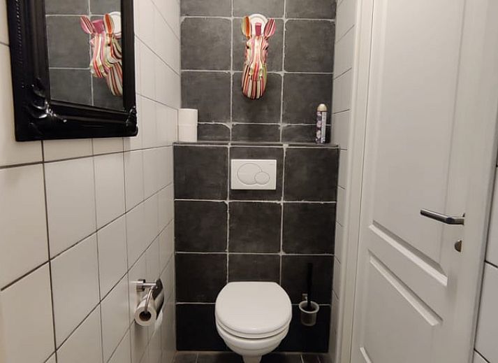 Cozy living room in Holiday home in Best, Heart of Brabant, with rustic decor and plenty of natural light in North Brabant.