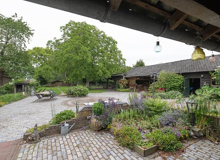 Cozy living room in Holiday home in Best, Heart of Brabant, with rustic decor and plenty of natural light in North Brabant.