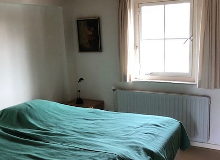 Terrasse mit Sitzgelegenheit im Ferienhaus in Mill, Nordbrabant, idealer Ort zum Entspannen.