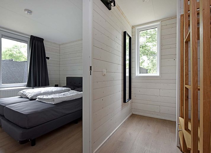 Binnenruimte van Vrijstaande woning in Schaijk, Noord Brabant, met gezellige zithoek en moderne keuken.