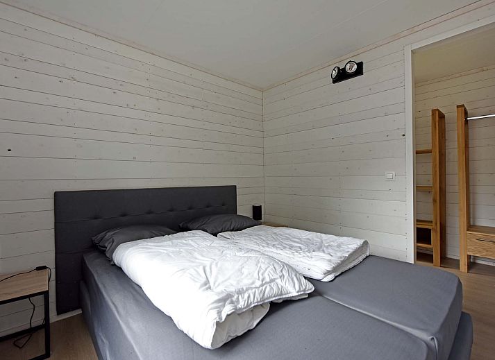 Binnenruimte van Vrijstaande woning in Schaijk, Noord Brabant, met gezellige zithoek en moderne keuken.