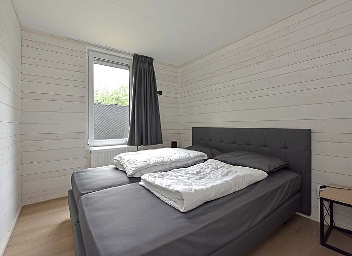 Binnenruimte van Vrijstaande woning in Schaijk, Noord Brabant, met gezellige zithoek en moderne keuken.