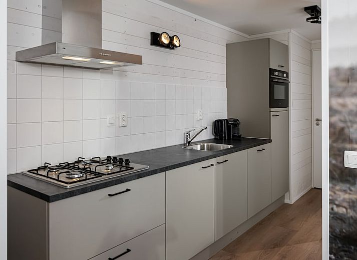 Forest Villa 6 in Schaijk, Nordost-Brabant, ein modernes Ferienhaus, umgeben von gruener Natur und Ruhe.