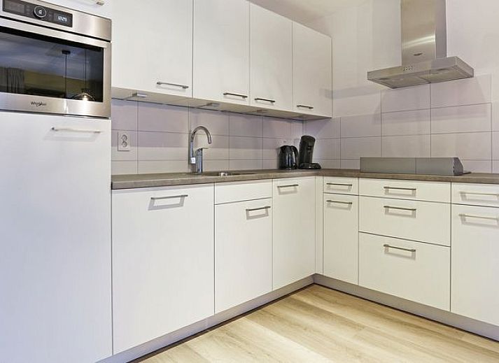 Speelse kinderkamer in De Vers 6-persoons bungalow Overloon met stapelbed en speelhoek.