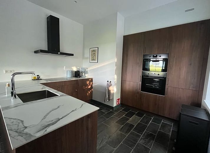 Authentiek vakantiehuis in Overloon, Noord Brabant, met charmante gevel en landelijke uitstraling.