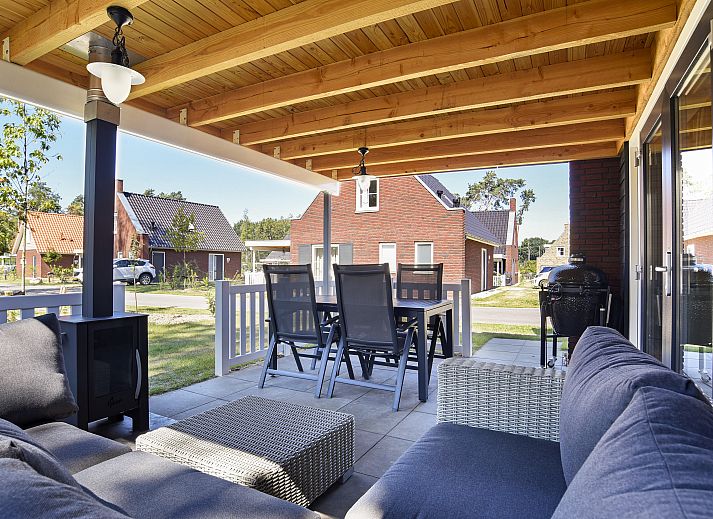 Stylish interior of De Vers 4-bed bungalow in Overloon, northeast Brabant with comfortable seating area.