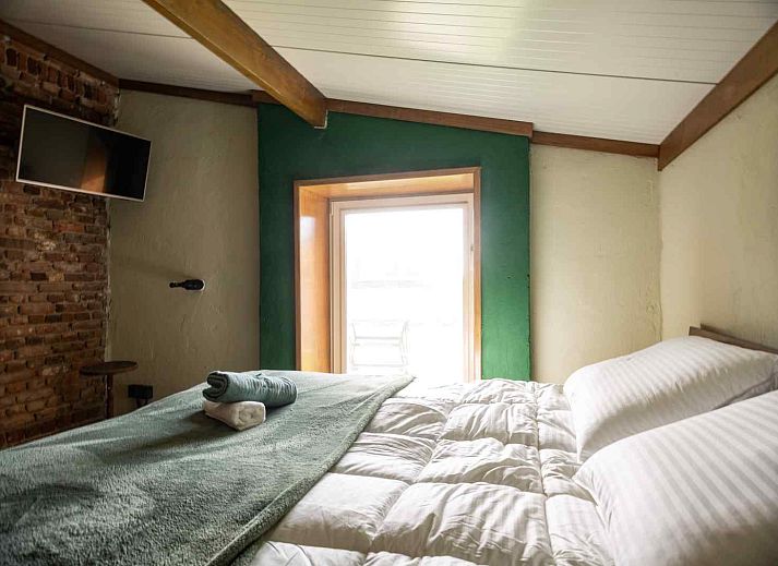 Vakantiehuis NB090 in Volkel, Noordoost Brabant met een charmant terras in de natuur.