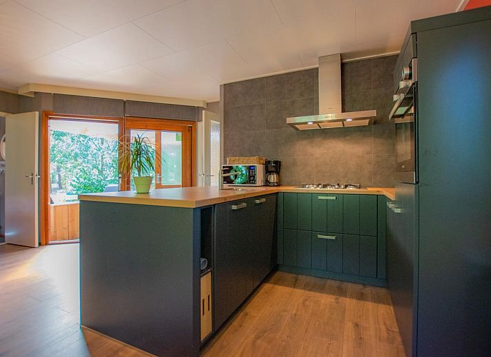 White Bungalow surrounded by nature in Uden, Northeast Brabant, North Brabant.