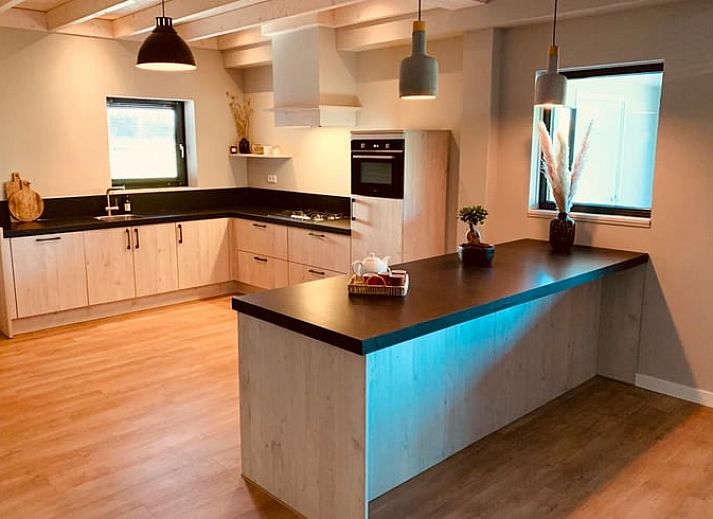 Huisje in Nistelrode, een vakantiehuis in Noordoost Brabant met ruime veranda en groen uitzicht.