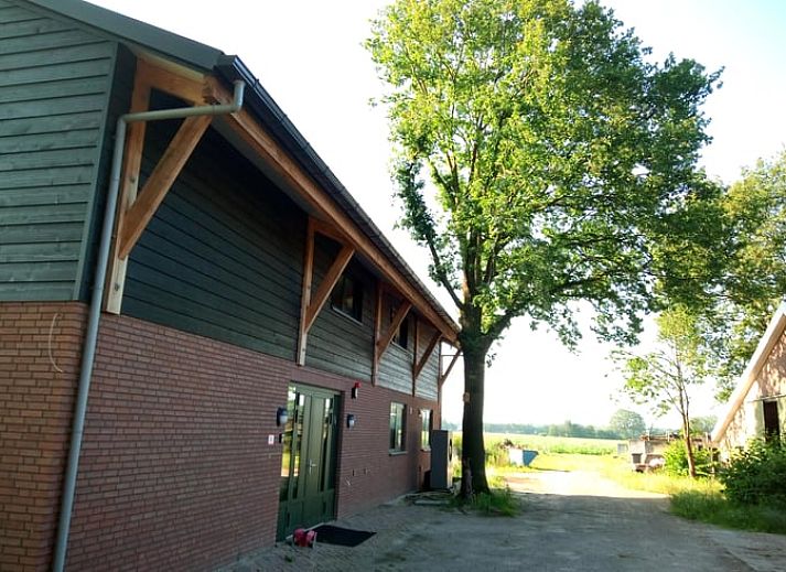 Vakantiehuis in Erp, Noord Brabant, buitenaanzicht met groene omgeving.