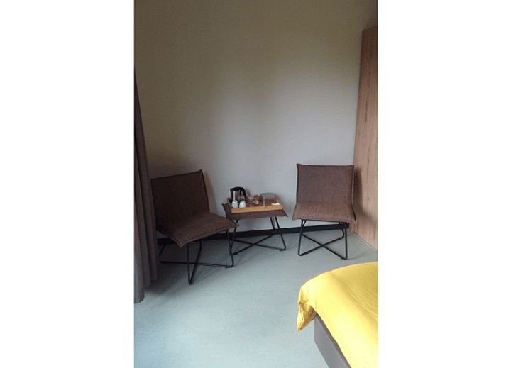 Vakantiehuisje in Erp met moderne architectuur en landelijke omgeving, perfect voor een rustige vakantie in Noordoost Brabant.