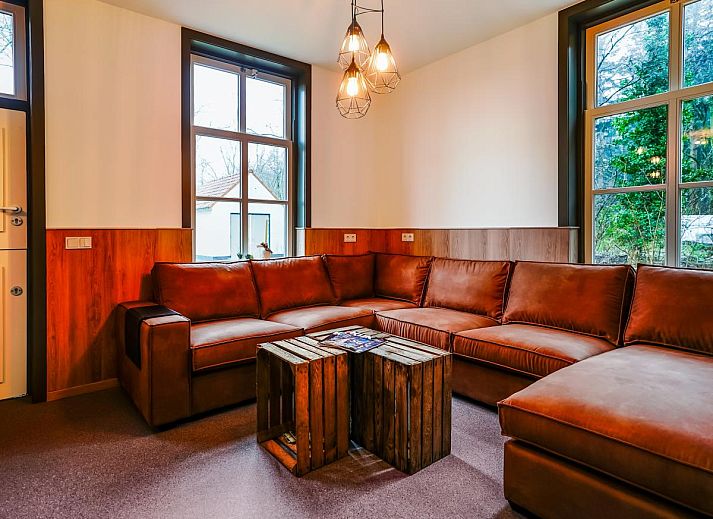 Vakantiehuis Bosbeertje 43 45 in Erp, Noordoost Brabant, omgeven door groene natuur en rustieke charme.