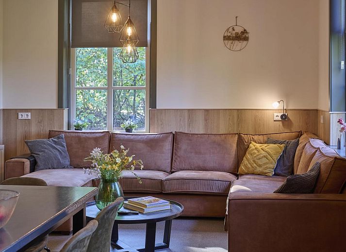 Vakantiehuis Bosbeertje 43 45 in Erp, Noordoost Brabant, omgeven door groene natuur en rustieke charme.