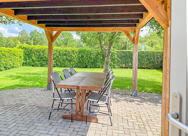 Cozy dining room of Alpacafarm Vorstenbosch vacation home in Vorstenbosch, northeast Brabant.