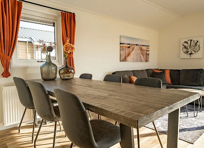 Cozy living room of detached house in Linden, Northeast Brabant, with comfortable sofas and lots of natural light.