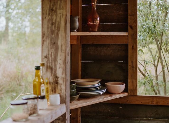Geniessen Sie die Ruhe im Huisje in Sint-Oedenrode, einem gemuetlichen Ferienhaus im Nordosten von Brabant mit einer einladenden Terrasse und gruener Umgebung.