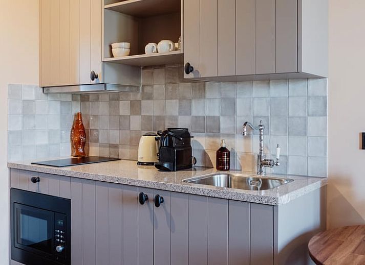 Rustiek vakantiehuis in Sint-Oedenrode, Noordoost Brabant, omgeven door groene natuur en landelijke charme.