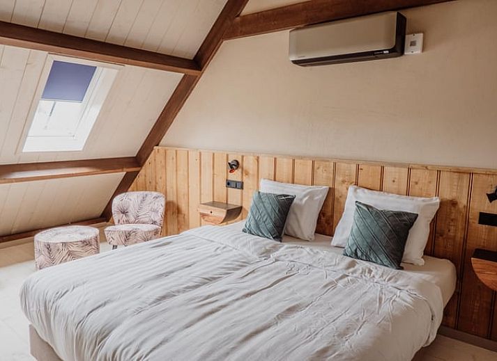 Rustiek vakantiehuis in Sint-Oedenrode, Noordoost Brabant, omgeven door groene natuur en landelijke charme.