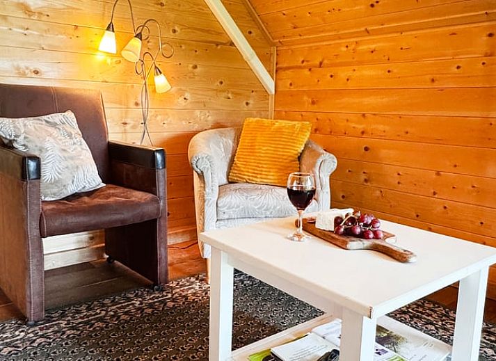 Gezellige slaapkamer in Huisje in Vortum Mullem, vakantiehuis in Vortum-Mullem, Noord-Brabant, met houten interieur.