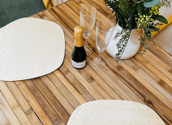 Bright interior of Holiday Home in Ledeacker with comfortable seating and wooden interior.