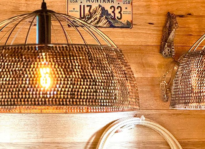 Cozy kitchen and dining area in Holiday Home in Ledeacker, Northeast Brabant with wooden interior and modern amenities.