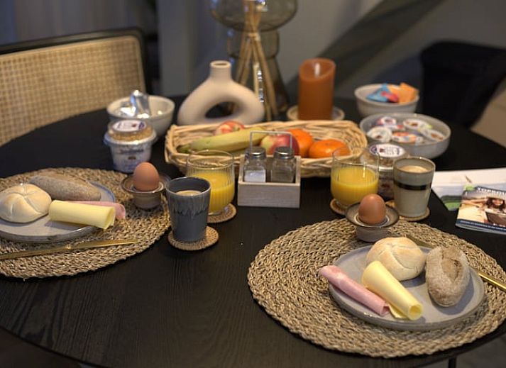 Cozy porch at Holiday Home in Sint Agatha, northeast Brabant, perfect for relaxation.