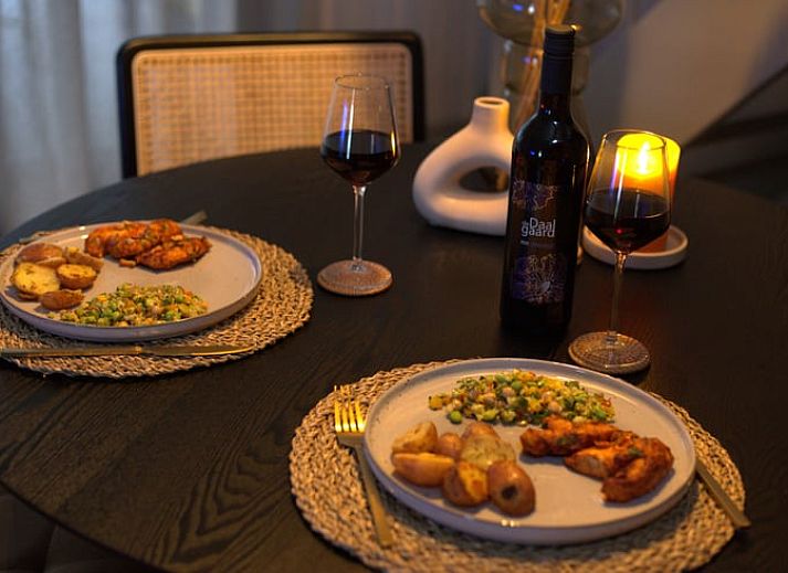 Cozy porch at Holiday Home in Sint Agatha, northeast Brabant, perfect for relaxation.