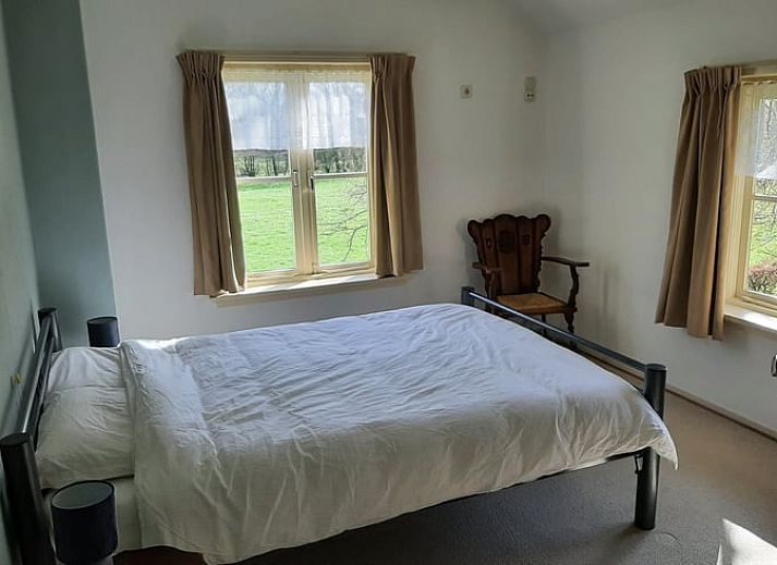 Rustiek Vakantiehuisje in Keent, Noordoost Brabant, omgeven door weelderige natuur en een serene omgeving in Noord Brabant.