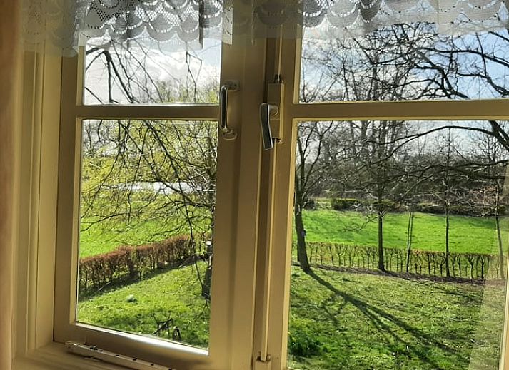 Rustiek Vakantiehuisje in Keent, Noordoost Brabant, omgeven door weelderige natuur en een serene omgeving in Noord Brabant.